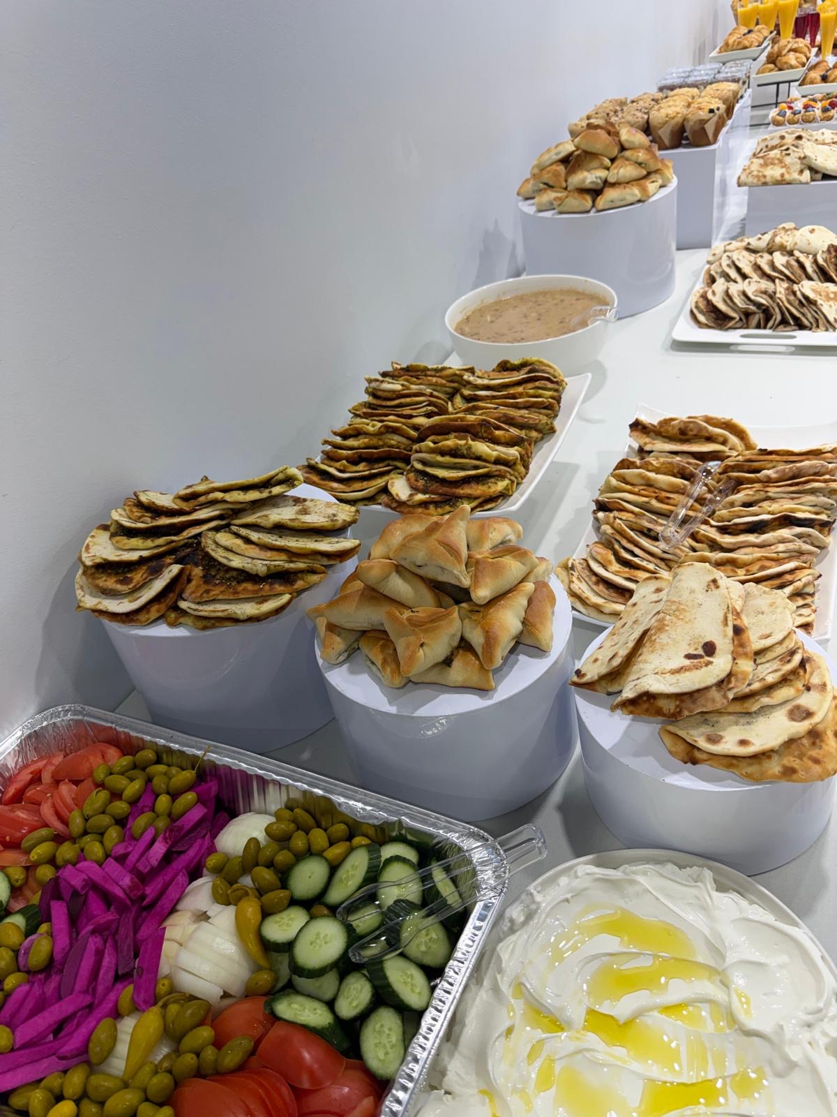 Manaeesh, labneh & pickles catering setup