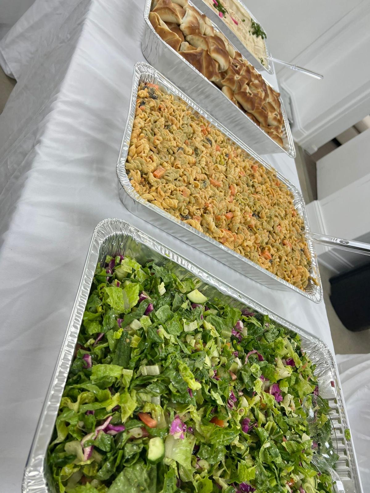 Catering lineup — salad, pasta & sambousek